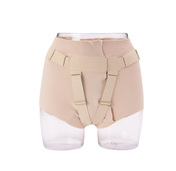 One beige FemiCushion EasyOpen Supporter worn by a see through mannequin placed over white back ground.